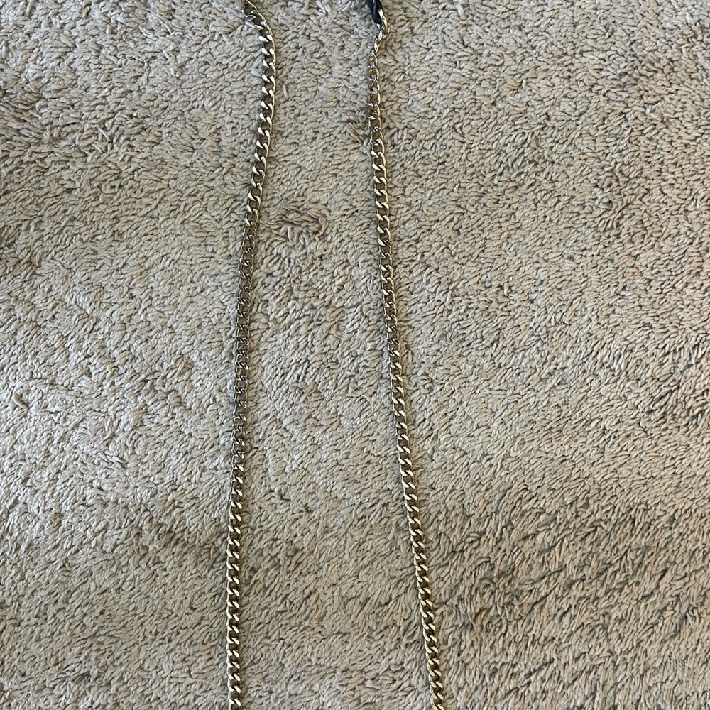 Michael Kors black and gold quilted handbag